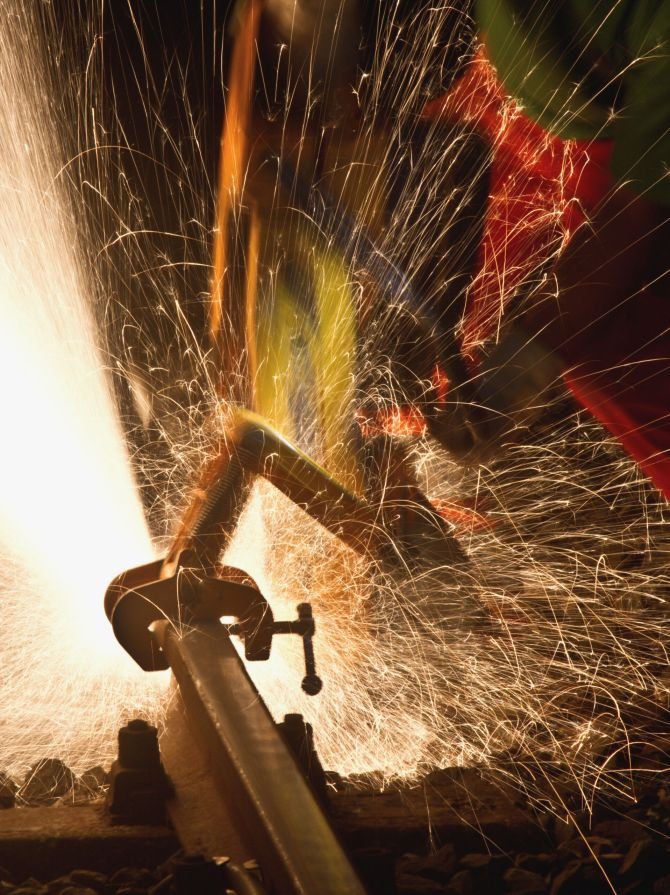 Anonymous man working with steel Anonymous man working with steel